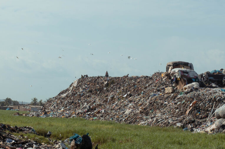 Discarded clothes from UK brands dumped in protected Ghana wetlands