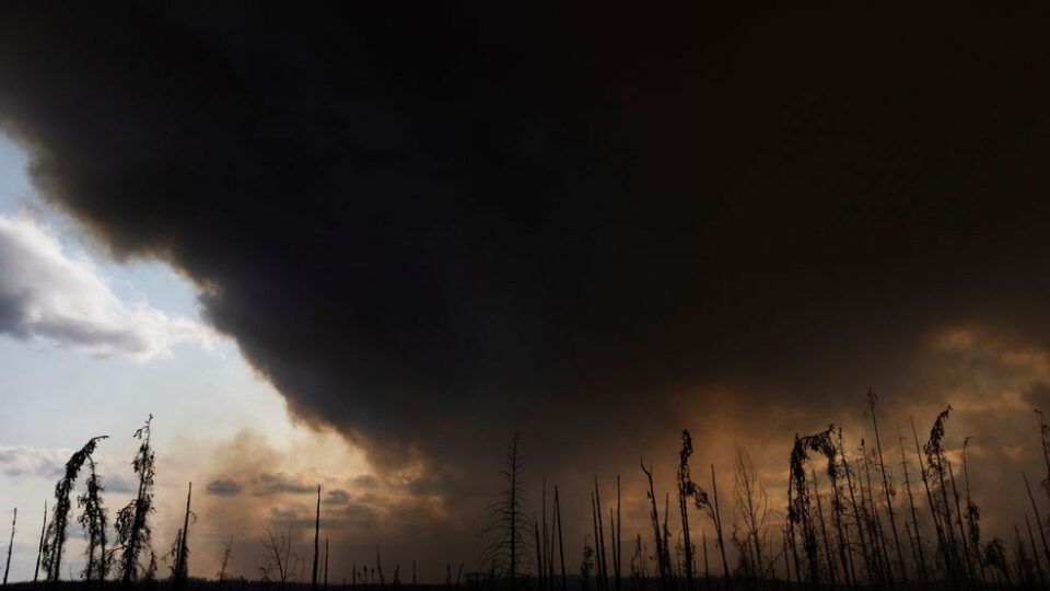 Thousands evacuated in three Canadian provinces as wildfires continue