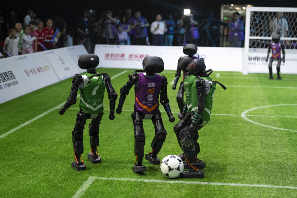 China hosts first fully autonomous AI robot football match